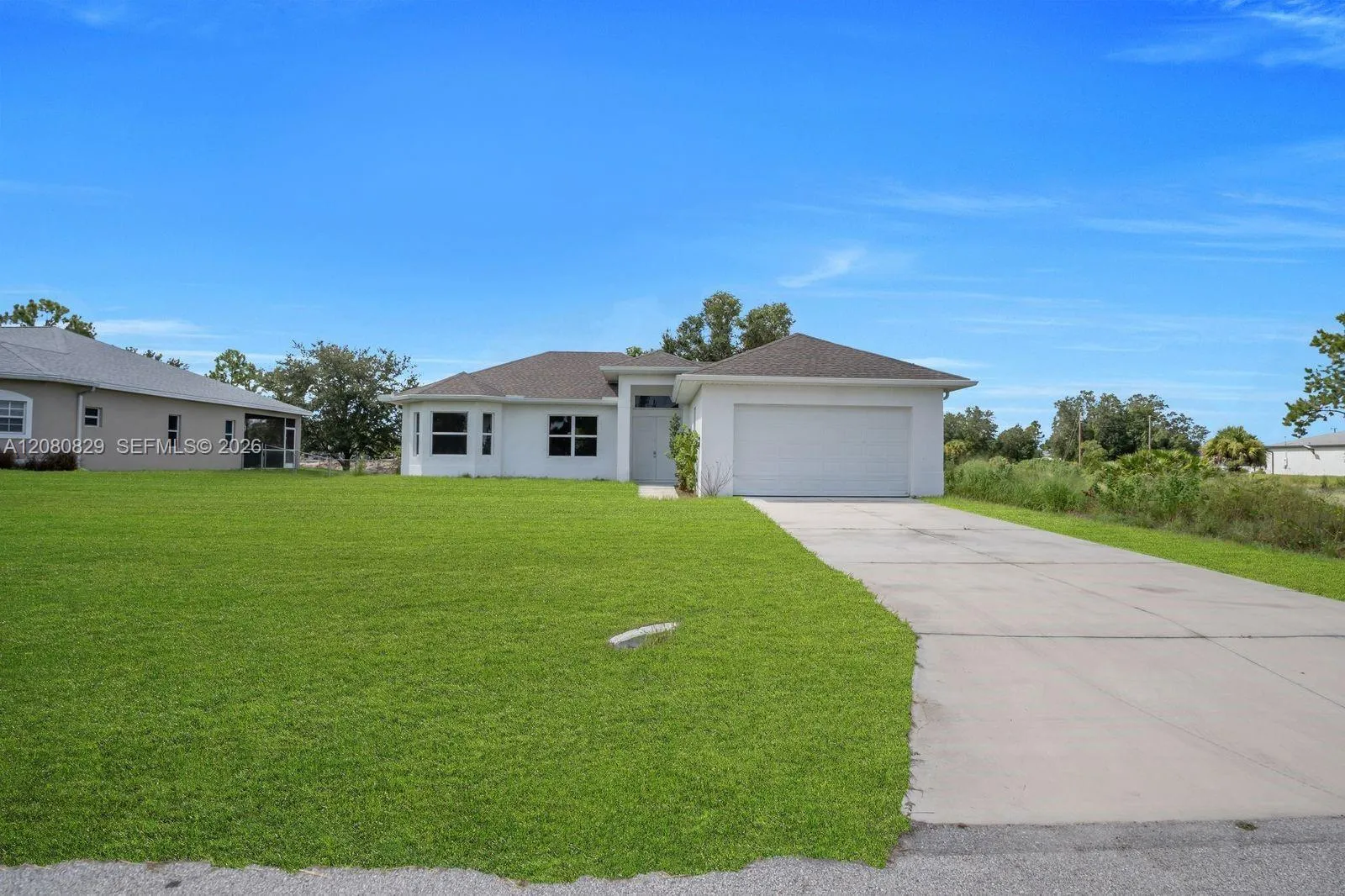 Foto de propiedad en 856 William Denver Street, Lehigh Acres, FL 33974 Lehigh Acres con MLS# 