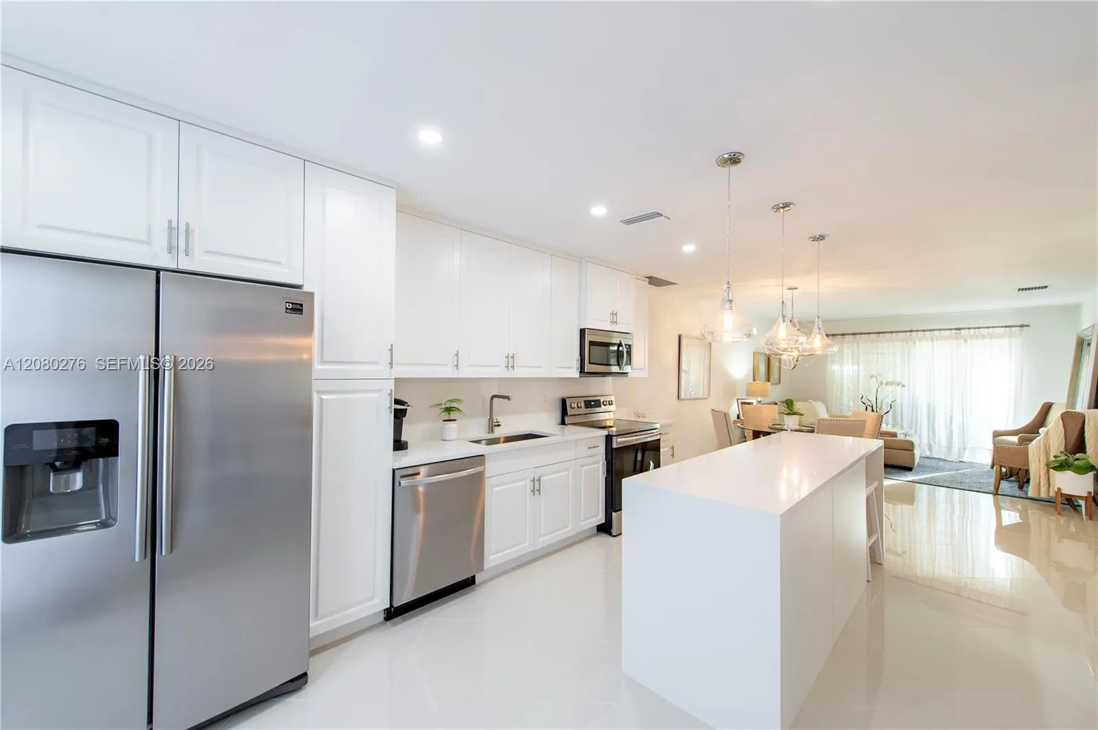 Foto de propiedad en 8580 Bella Vista Drive, Boca Raton, FL 33433 Boca Raton con MLS# 