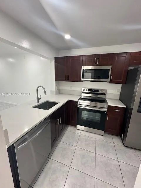 Foto de propiedad en 861 NE 207th Lane 201-14, Miami, FL 33179 Miami con MLS# 