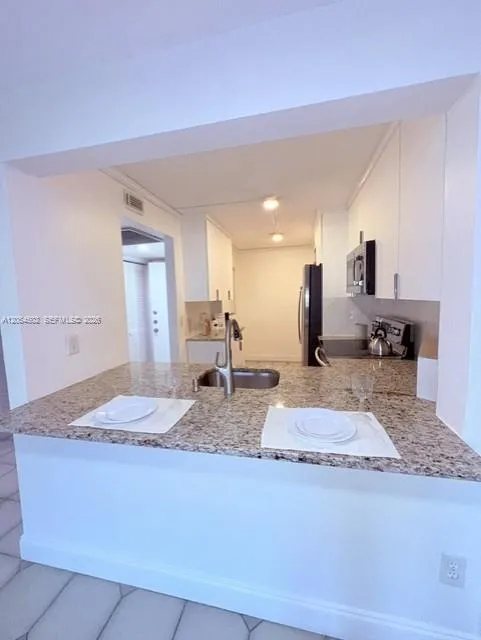 Foto de propiedad en 871 NE 207th Terrace 4-102, Miami, FL 33179 Miami con MLS# 