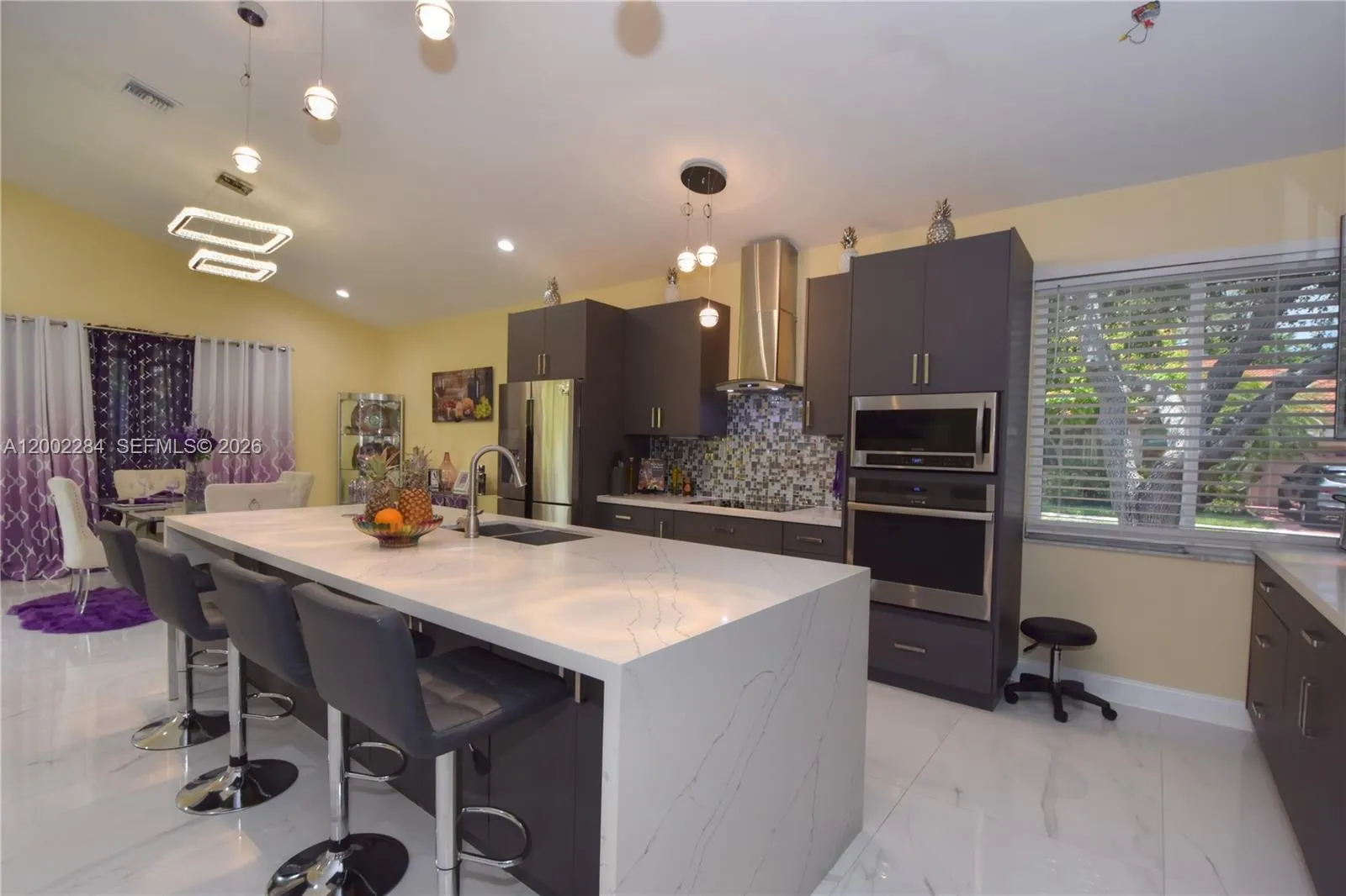 Foto de propiedad en 8733 NW 76th Drive, Tamarac, FL 33321 Tamarac con MLS# 