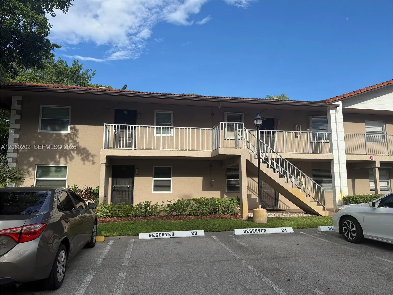 Foto de propiedad en 8750 Royal Palm Boulevard 201-3, Coral Springs, FL 33065 Coral Springs con MLS# 
