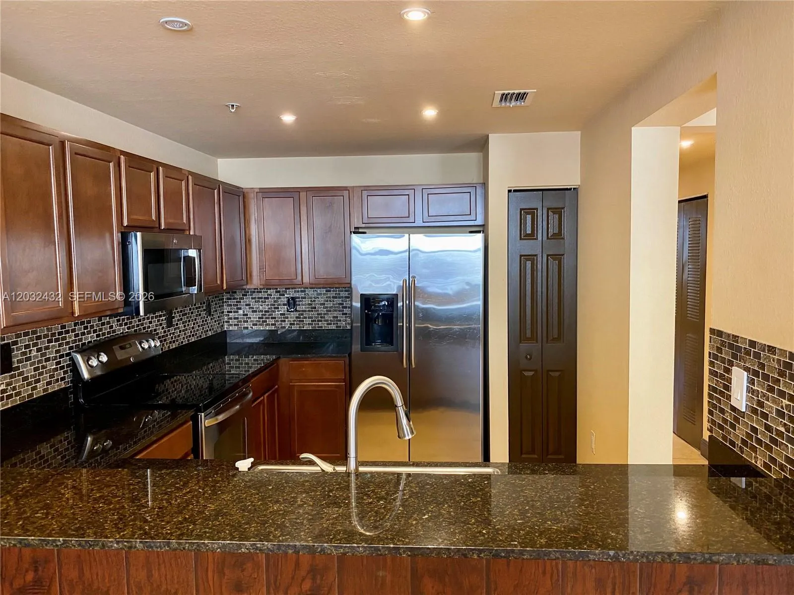 Foto de propiedad en 8800 NW 107th Court 110, Doral, FL 33178 Doral con MLS# 
