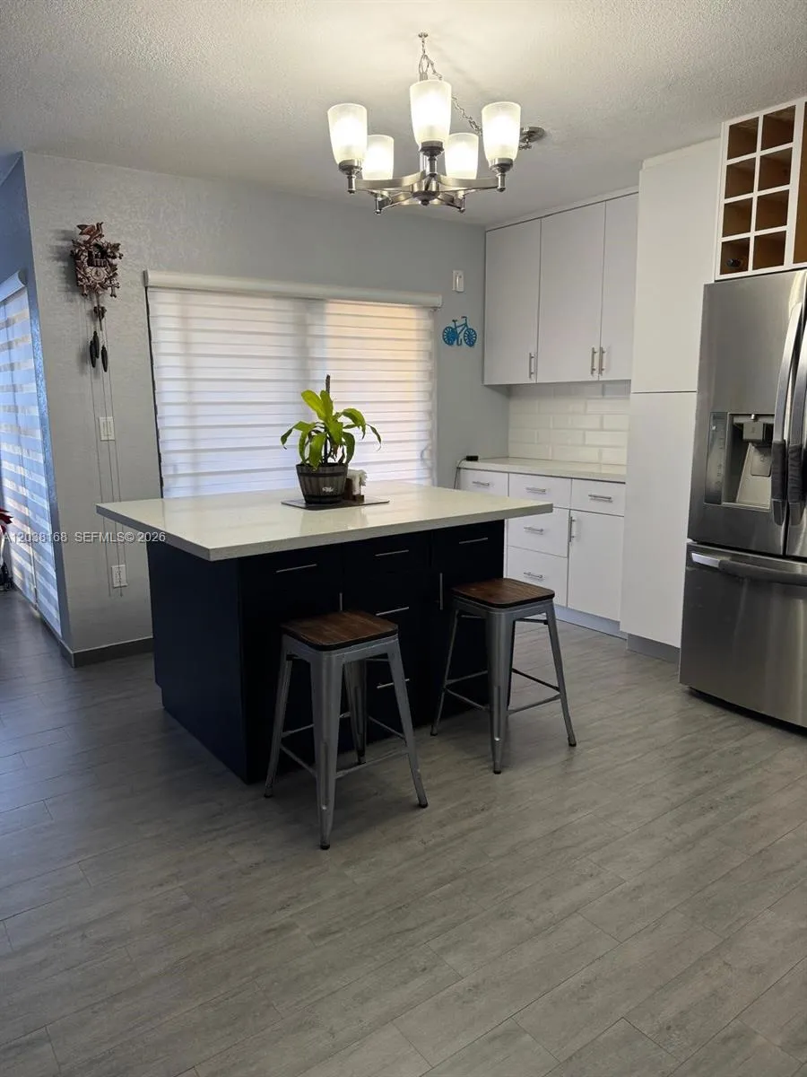 Foto de propiedad en 8820 SW 123rd Court L410, Miami, FL 33186 Miami con MLS# 