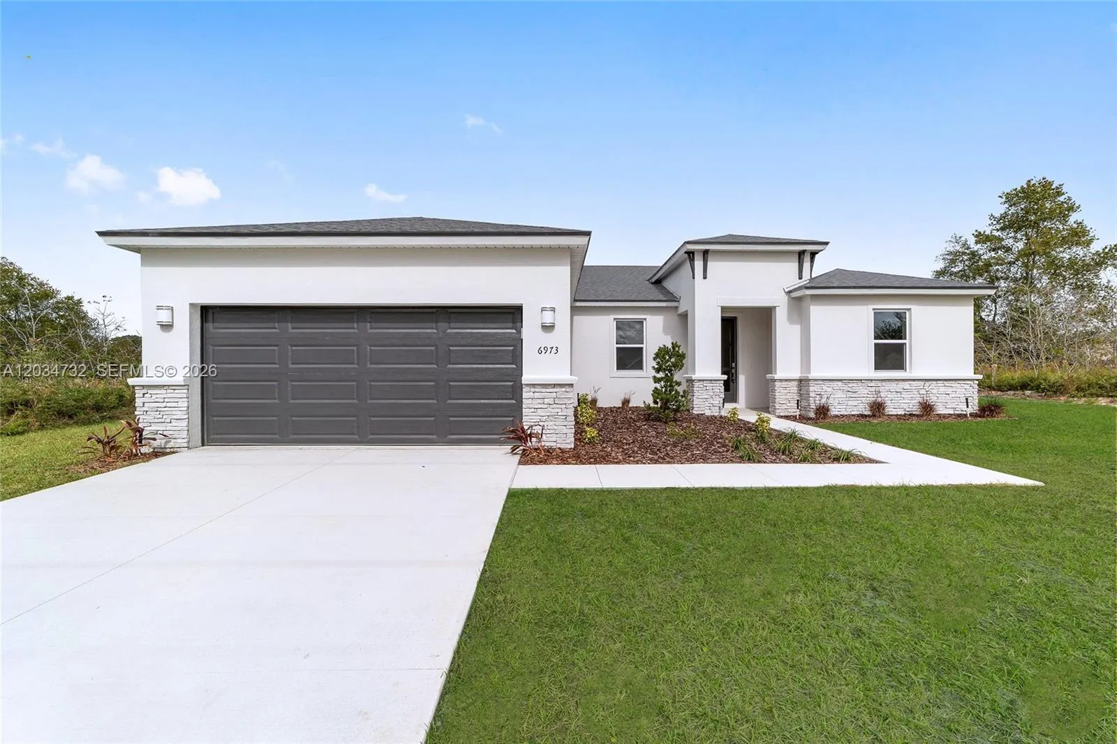 Foto de propiedad en 885 Talmadge Avenue SE, Palm Bay, FL 32909 Palm Bay con MLS# 