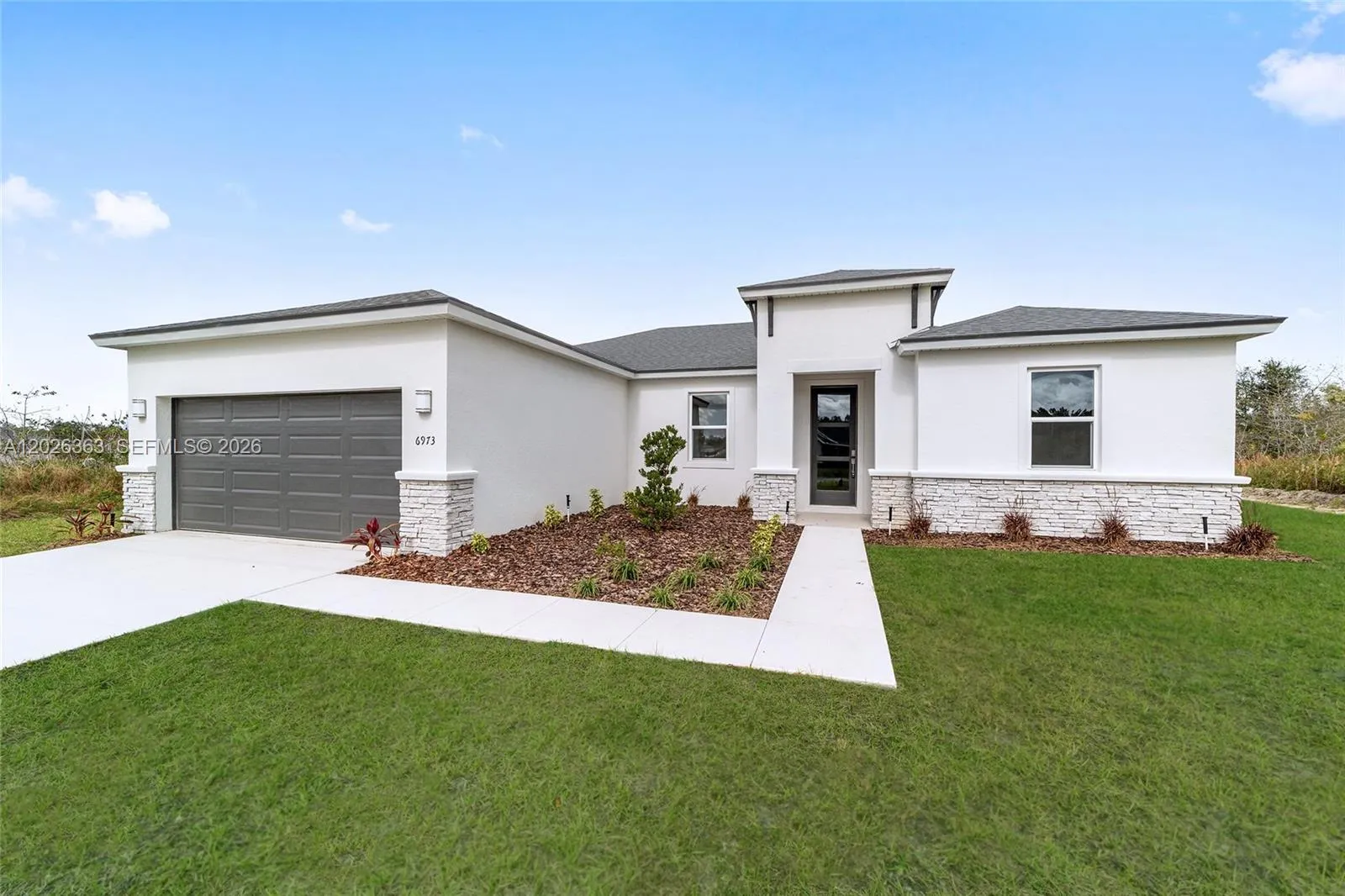 Foto de propiedad en 885 Talmadge Avenue SE, Palm Bay, FL 32909 Palm Bay con MLS# 