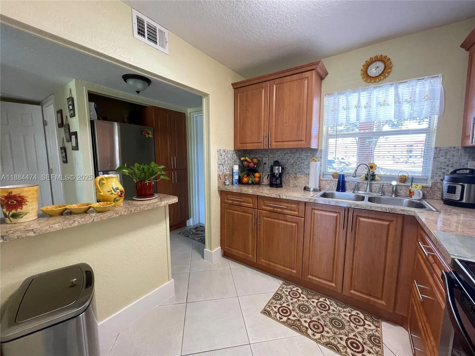 Foto de propiedad en 9041 Sunrise Lakes Boulevard 108, Sunrise, FL 33322 Sunrise con MLS# 