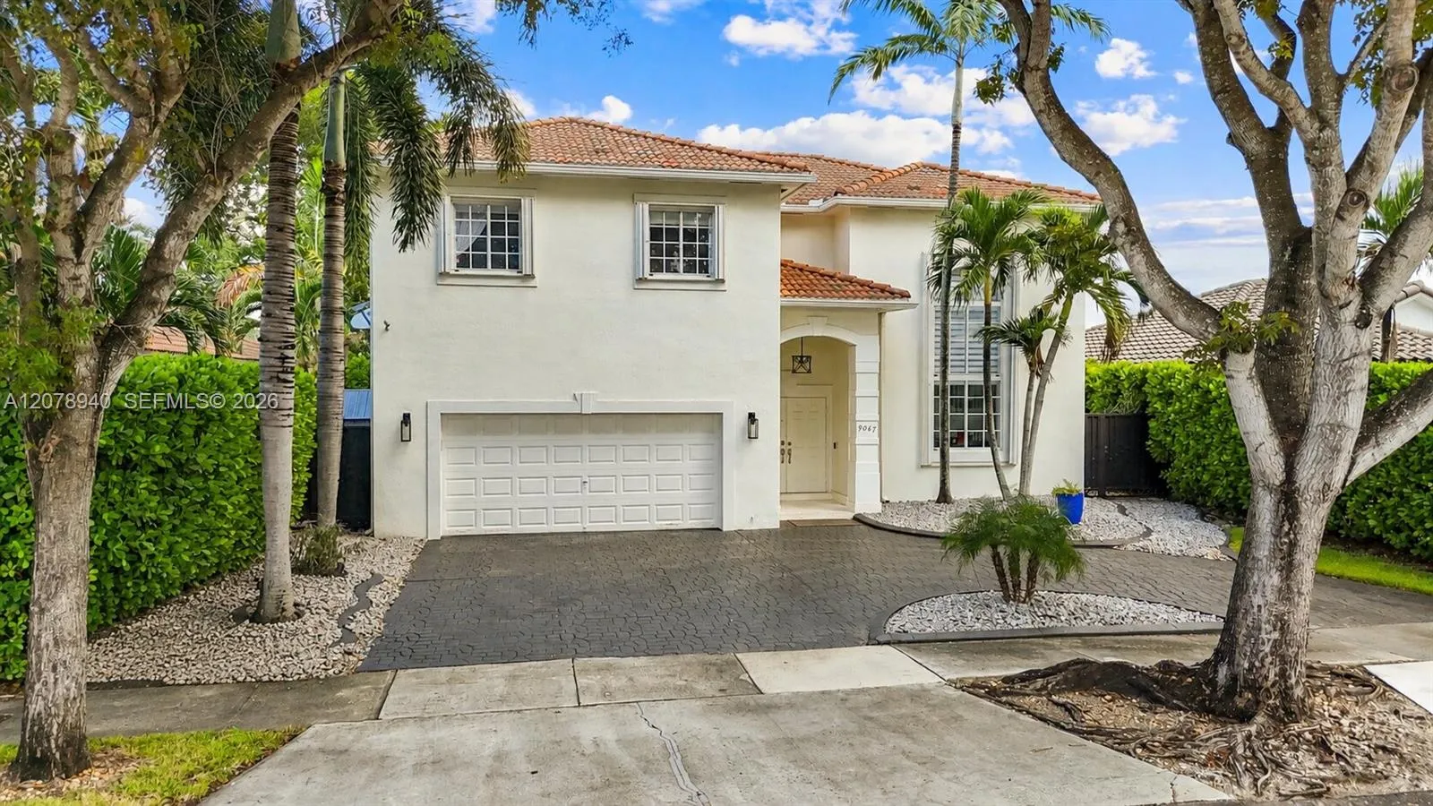 Foto de propiedad en 9067 NW 169th Street, Miami Lakes, FL 33018 Miami Lakes con MLS# 