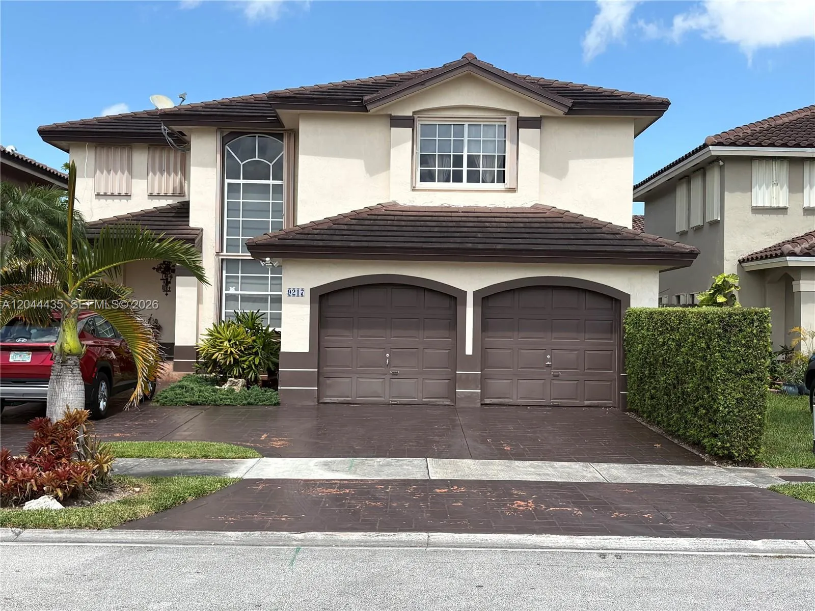 Foto de propiedad en 9217 SW 157th Path, Miami, FL 33196 Miami con MLS# 