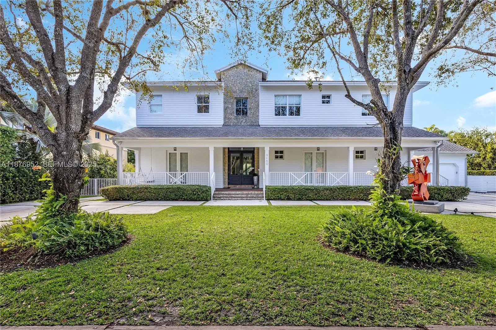 Foto de propiedad en 9460 SW 69th Avenue, Pinecrest, FL 33156 Pinecrest con MLS# 