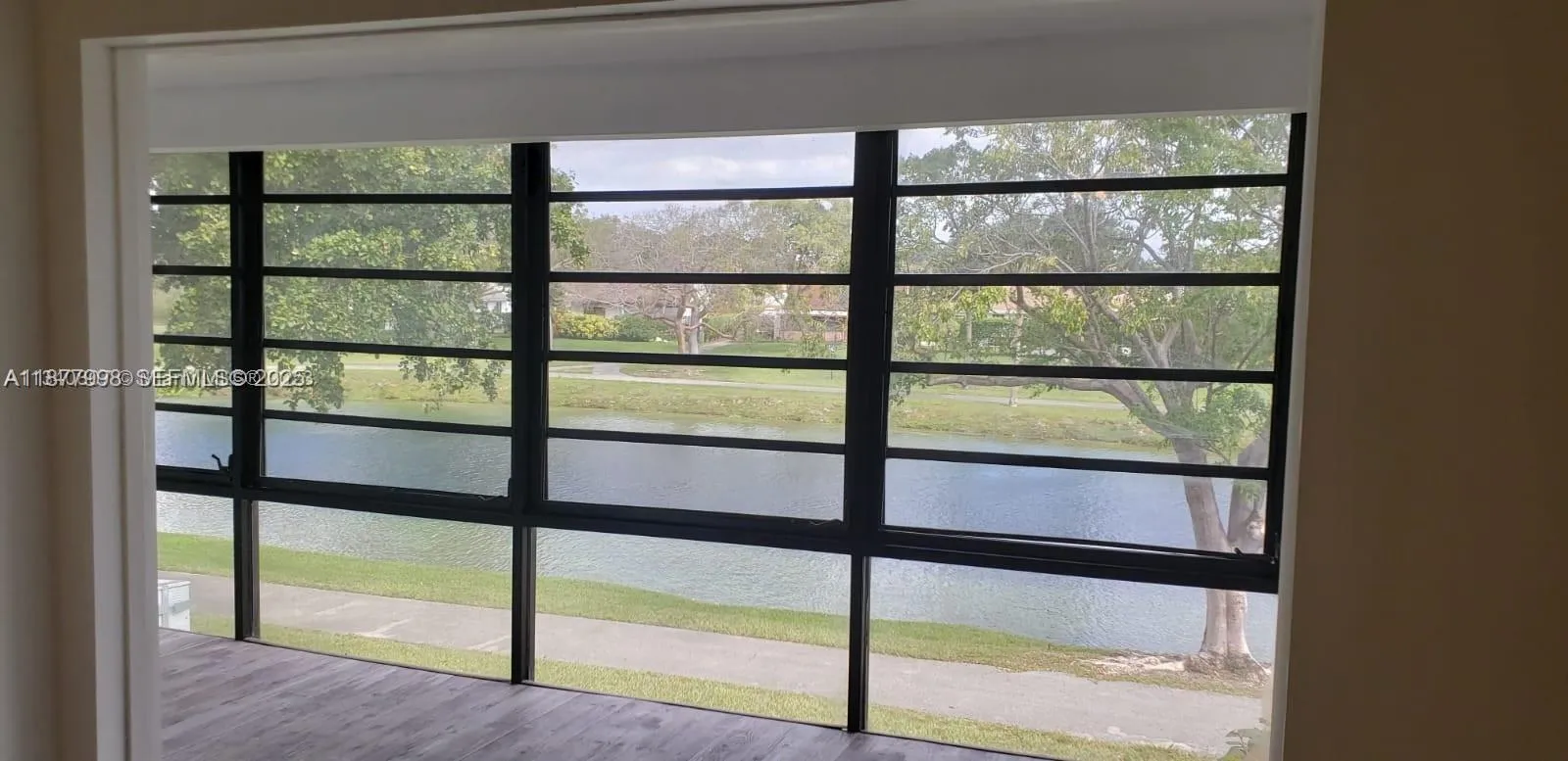 Foto de propiedad en 9709 Hammocks Boulevard 202, Miami, FL 33196 Miami con MLS# 