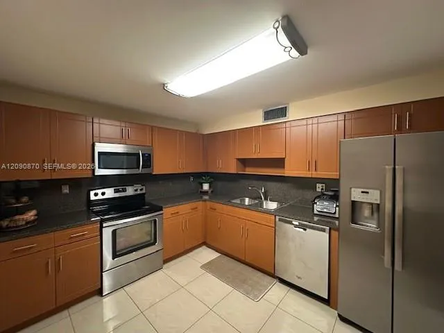Foto de propiedad en 9735 NW 52nd Street 107, Doral, FL 33178 Doral con MLS#