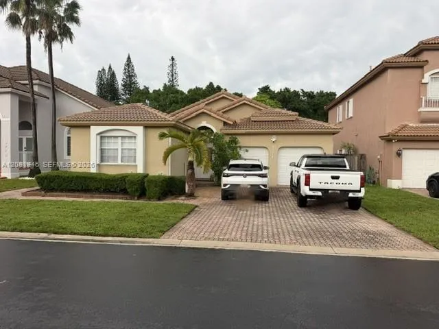 Foto de propiedad en 9771 NW 32nd Street 9771, Doral, FL 33172 Doral con MLS# 