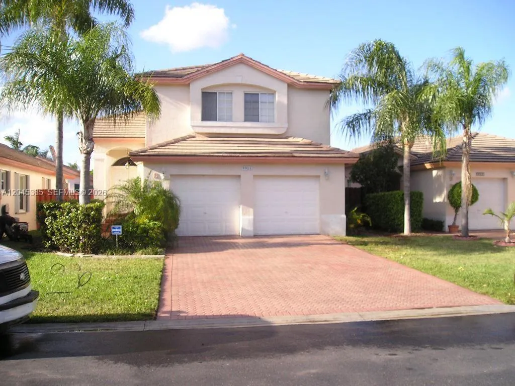 Foto de propiedad en 9921 NW 31st Street 9921, Doral, FL 33172 Doral con MLS# 