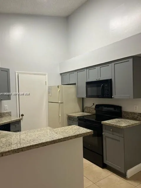 Foto de propiedad en 9999 Summerbreeze Drive 1009, Sunrise, FL 33322 Sunrise con MLS# 