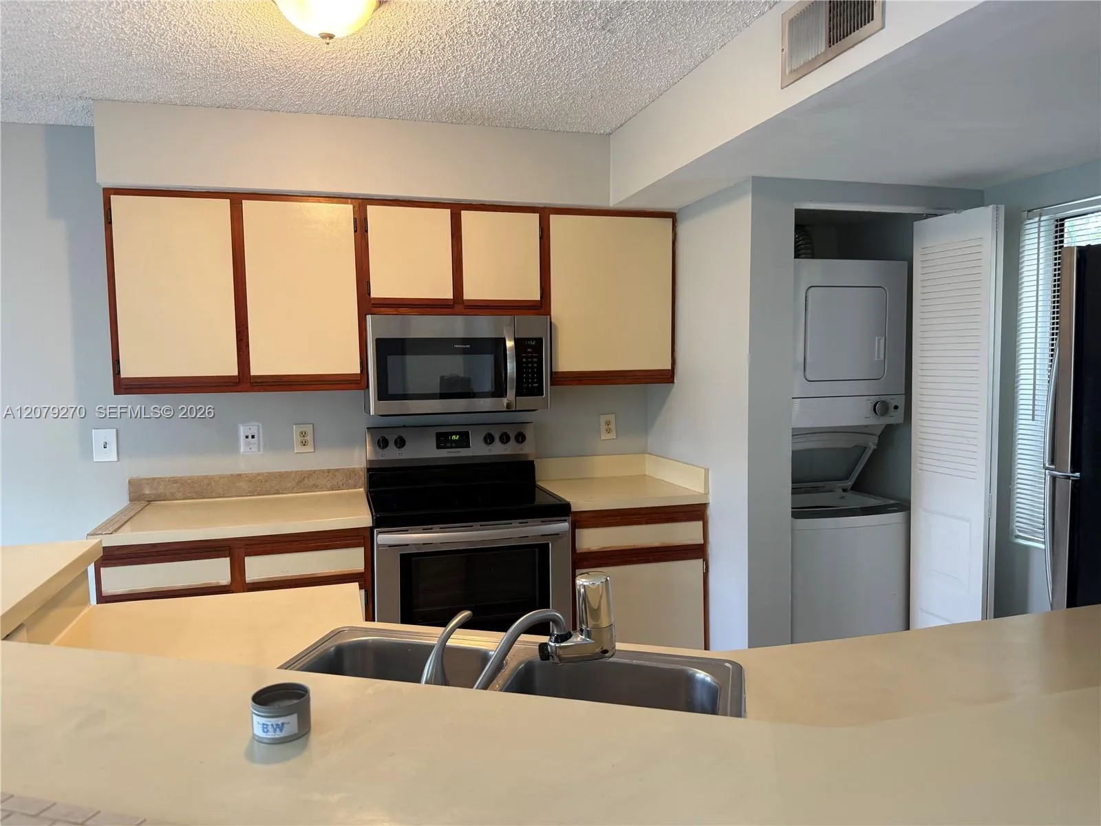 Foto de propiedad en 9999 Summerbreeze Drive 119, Sunrise, FL 33322 Sunrise con MLS# 