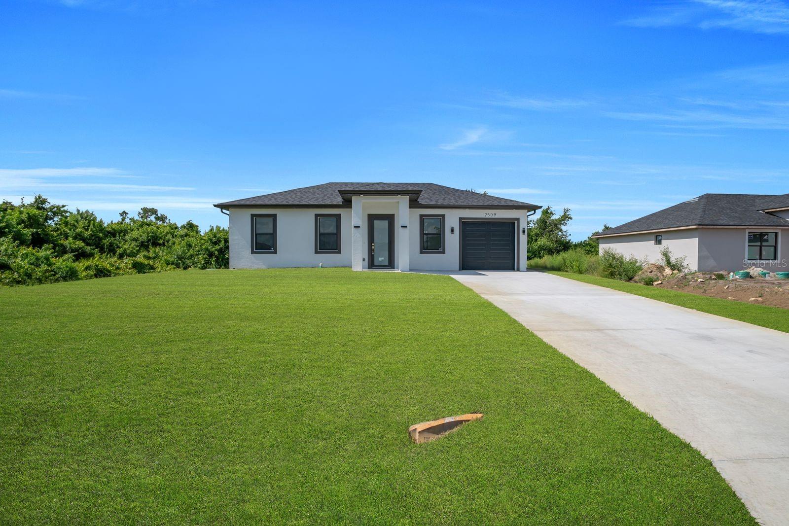 En Venta 2609 21ST ST SW, LEHIGH ACRES, FL 33976
