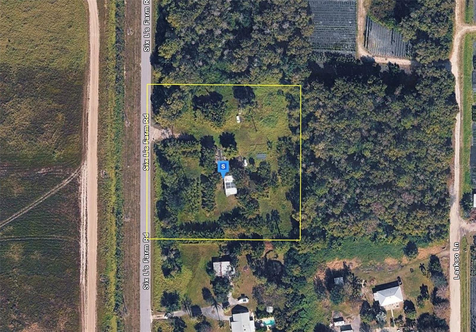 Foto de propiedad en 11072 SIX LS FARM RD NAPLES con MLS# A4700658