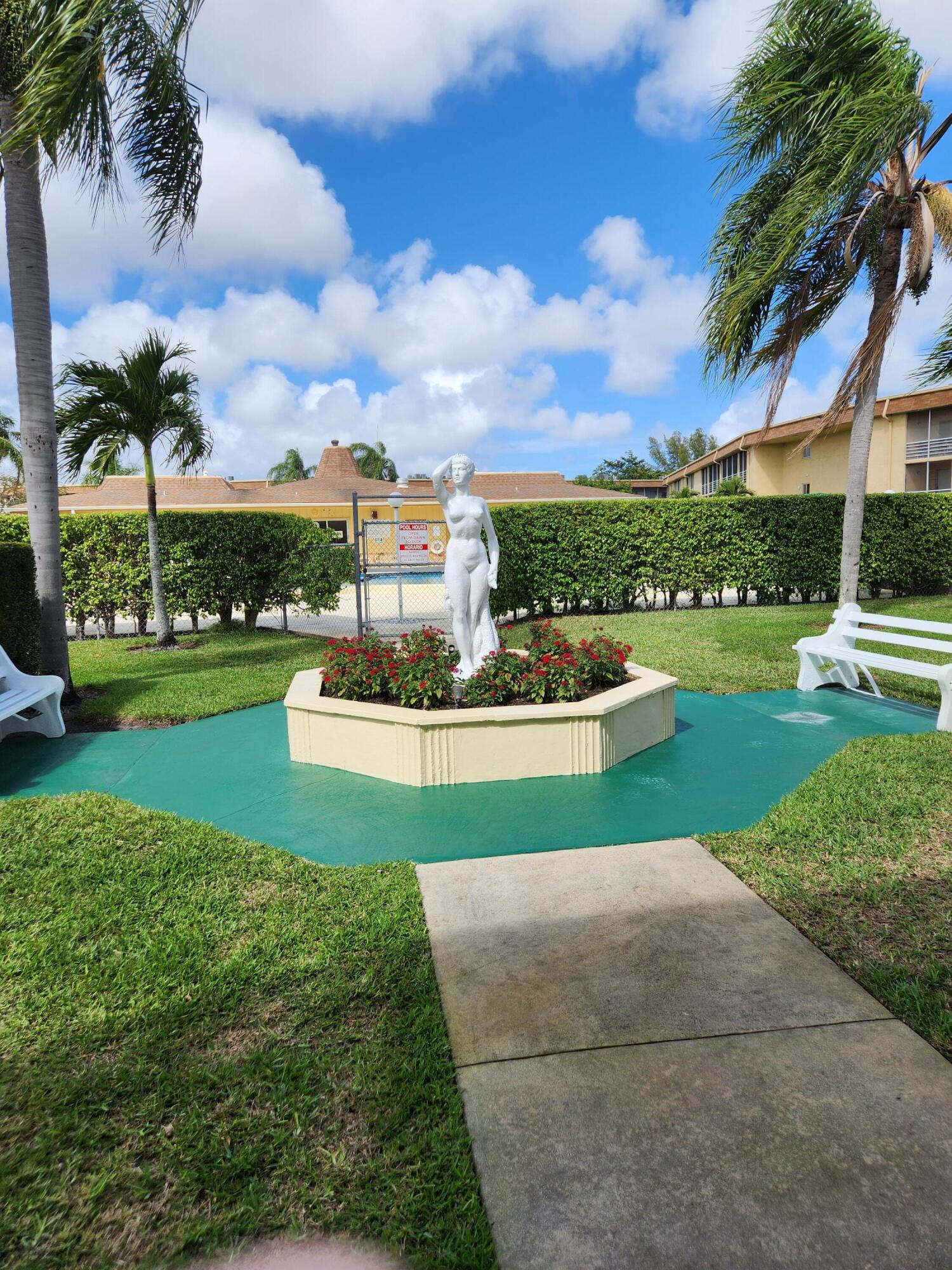 Garden Statue Entry to the Pool Area