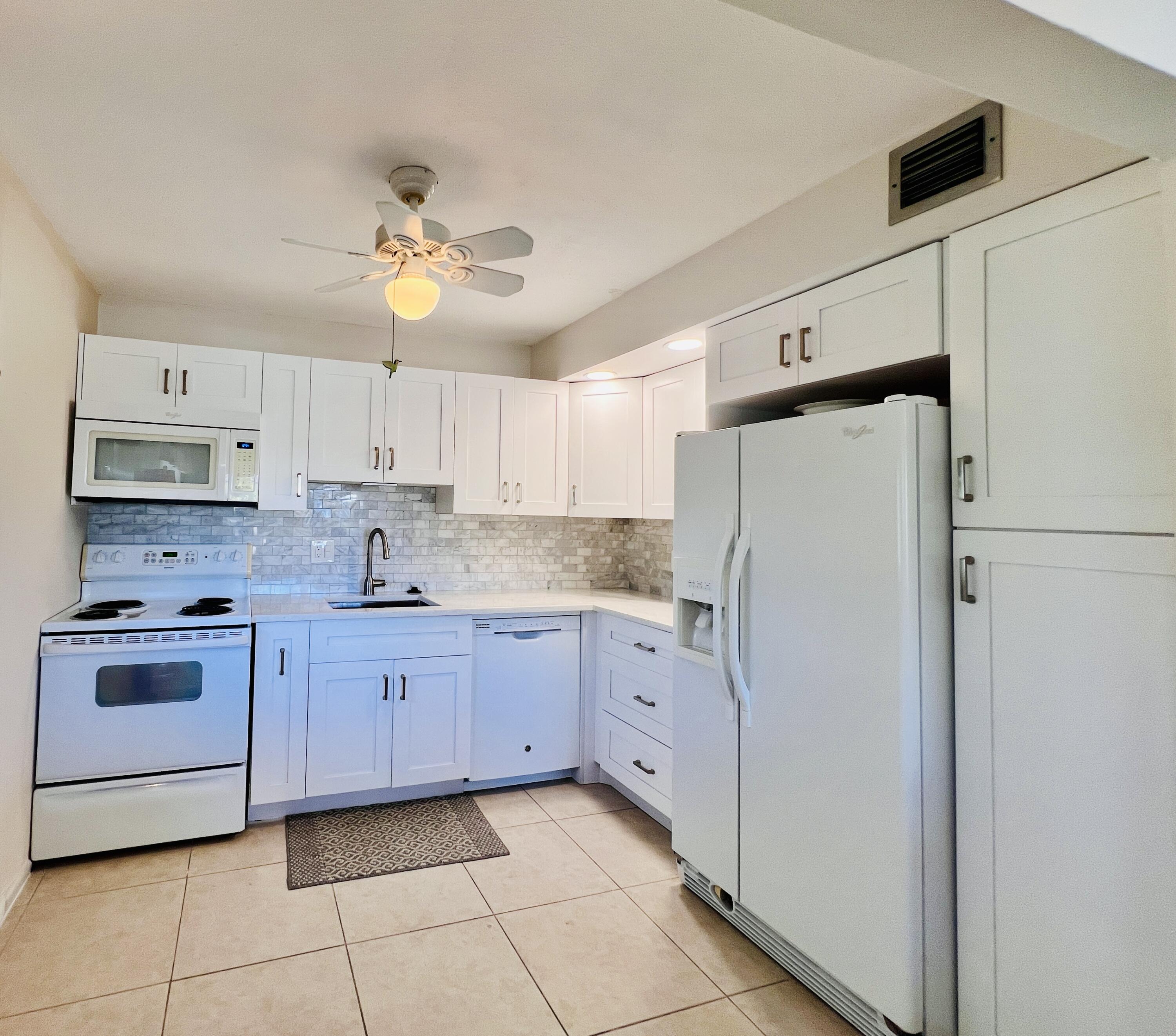Foto de propiedad en 314 Wellington D, West Palm Beach, FL 33417 West Palm Beach con MLS# 