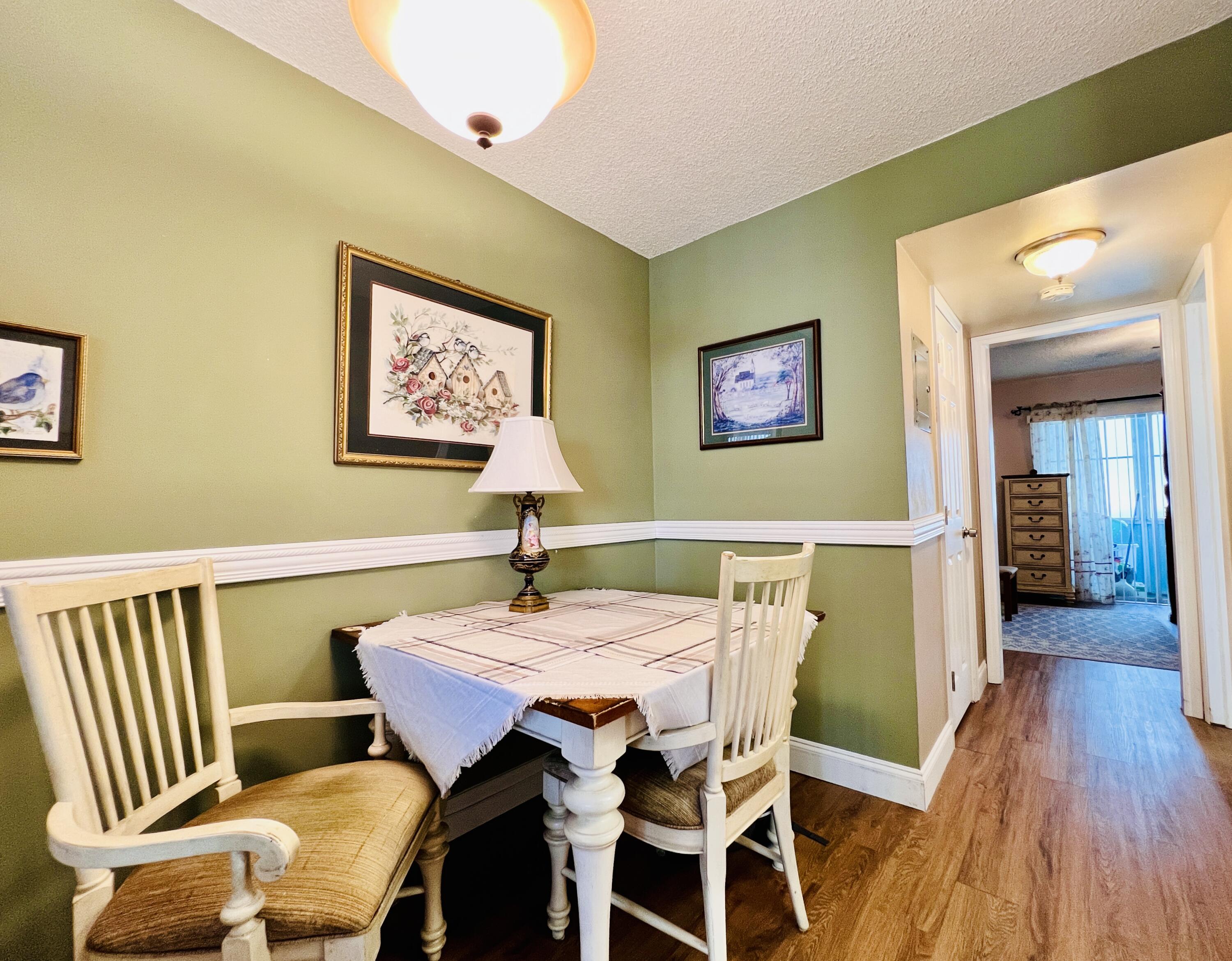 Adorable FIRST FLOOR 1/1 With Updates! Updated Flooring Throughout. Updated Full Bath W/ Step-in Shower