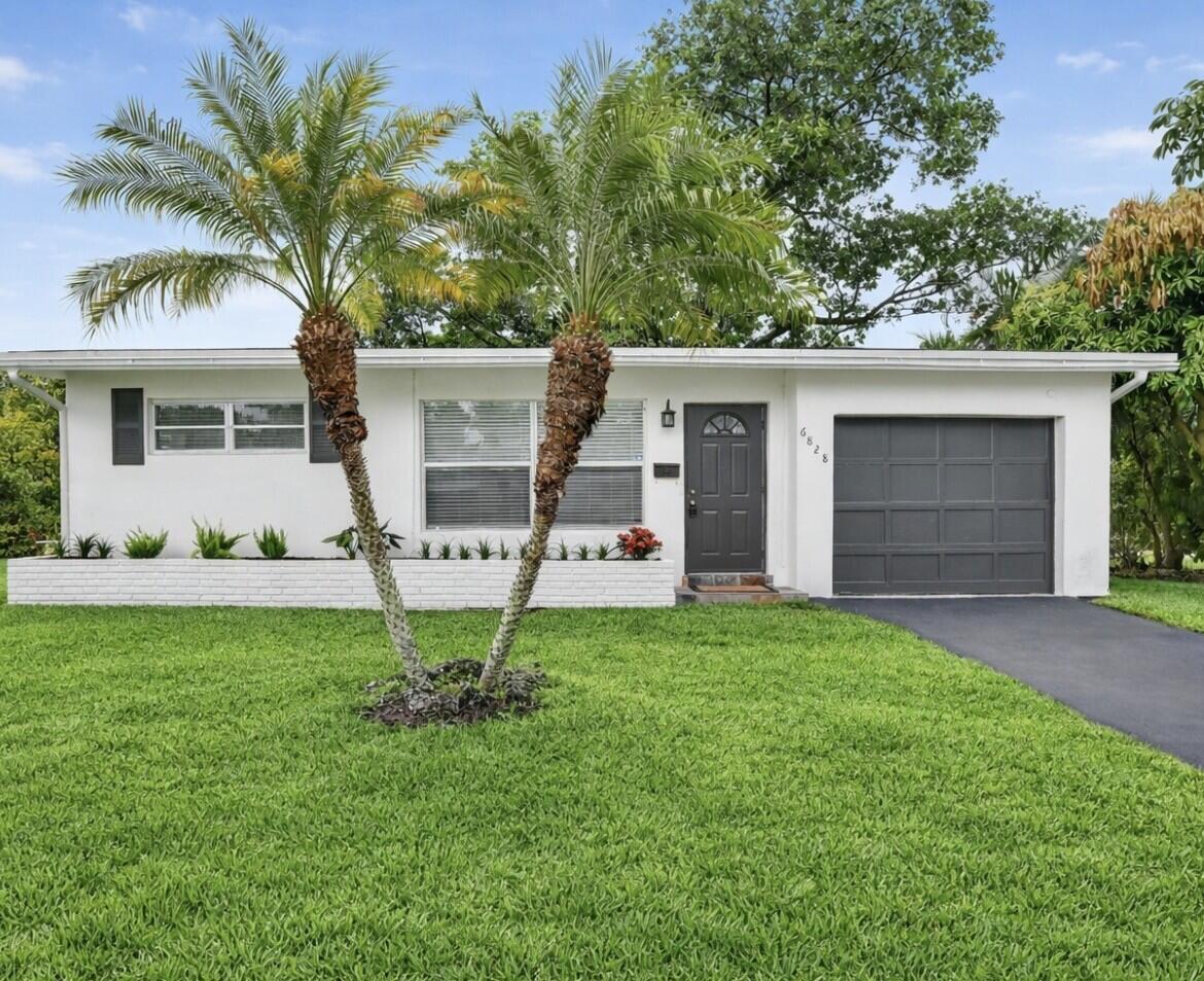 Foto de propiedad en 6828 NW 30th Street, Sunrise, FL 33313 Sunrise con MLS# 