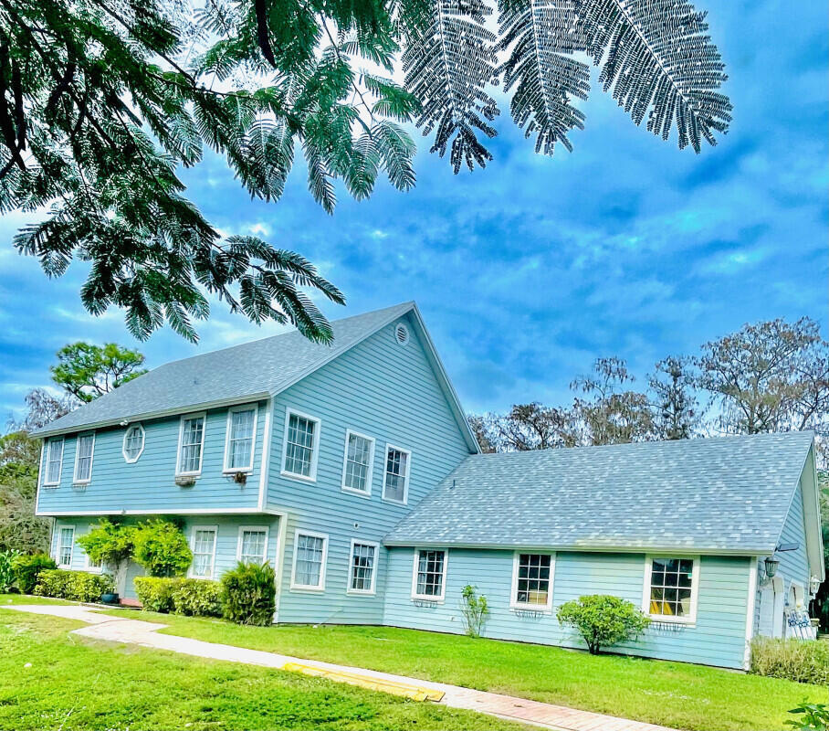 Foto de propiedad en 16745 Calder Drive E, The Acreage, FL 33470 The Acreage con MLS# 