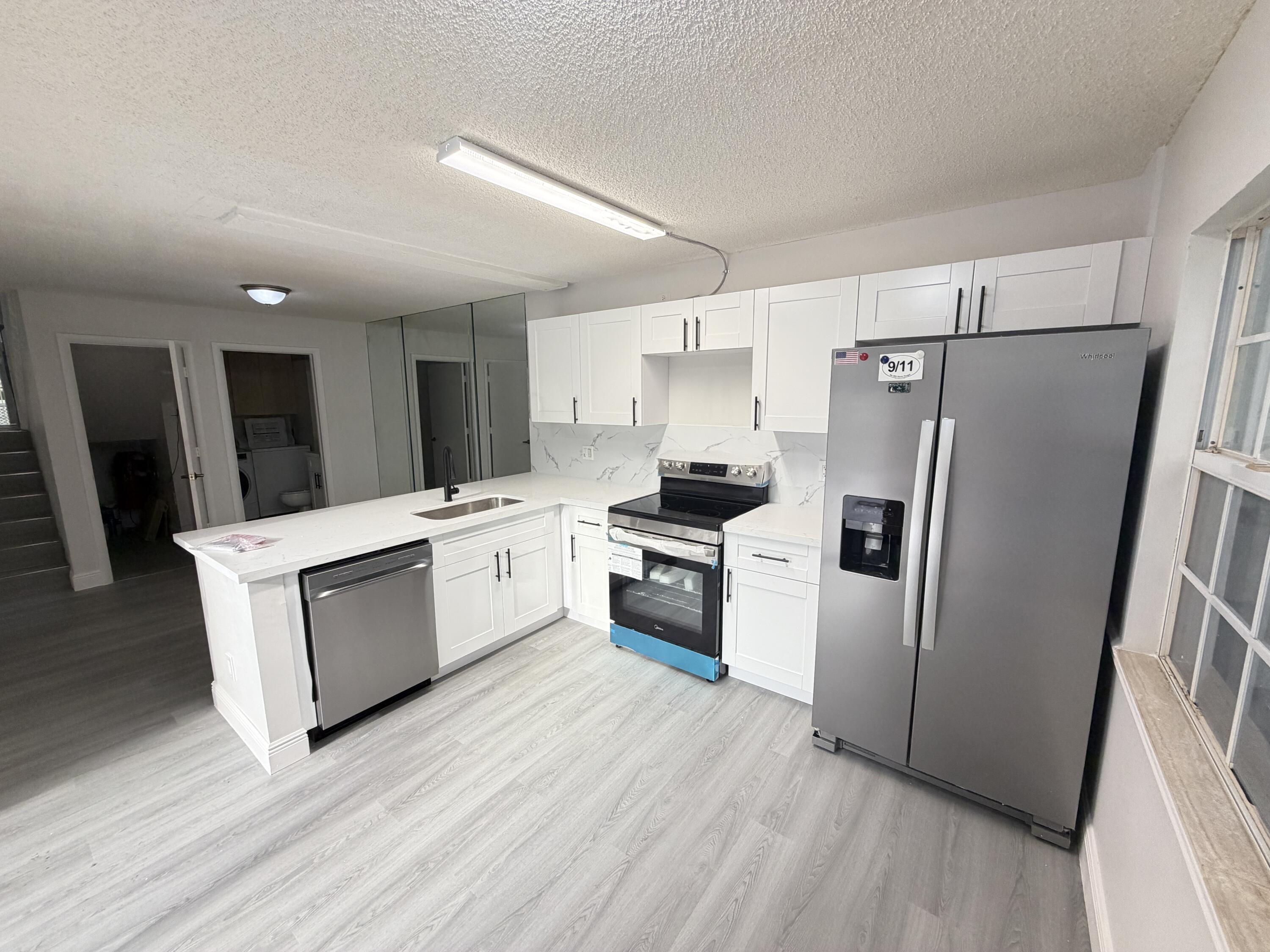 Foto de propiedad en 1956 Hartford Court, West Palm Beach, FL 33409 West Palm Beach con MLS# 