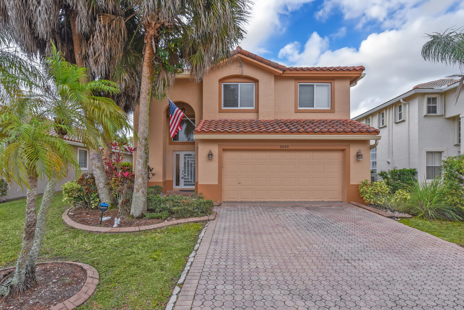 Foto de propiedad en 5049 NW 121st Drive, Coral Springs, FL 33076 Coral Springs con MLS# 