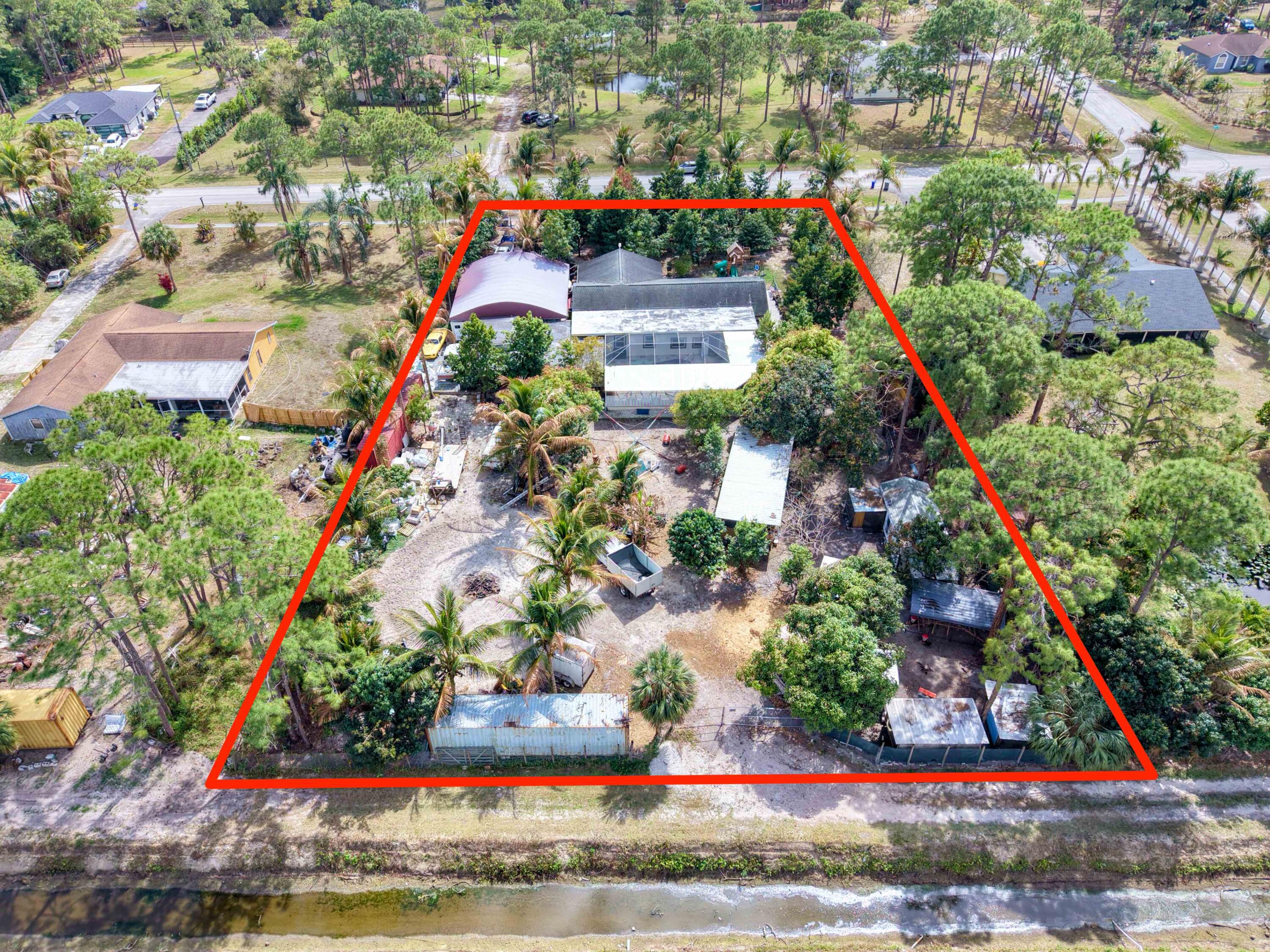 Foto de propiedad en 11481 Tangerine Boulevard, The Acreage, FL 33412 The Acreage con MLS# 