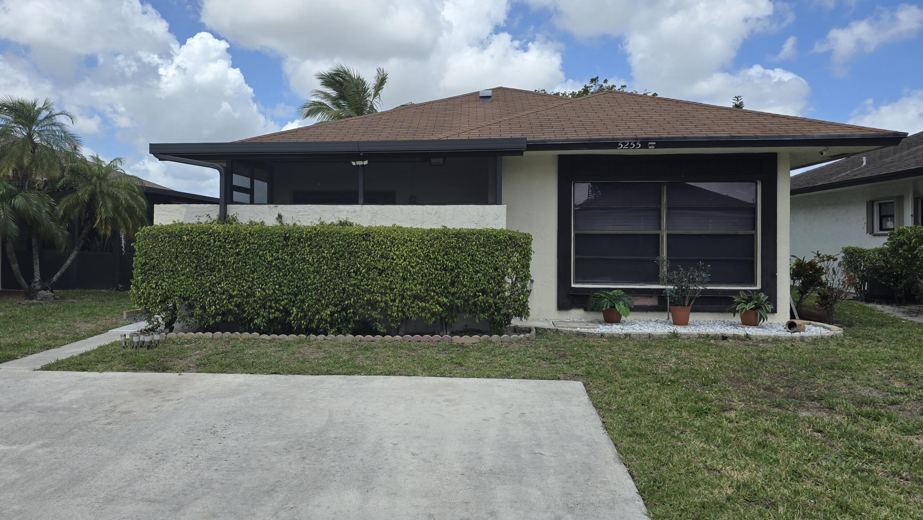 Foto de propiedad en 5255 Mendoza Street, West Palm Beach, FL 33415 West Palm Beach con MLS# 