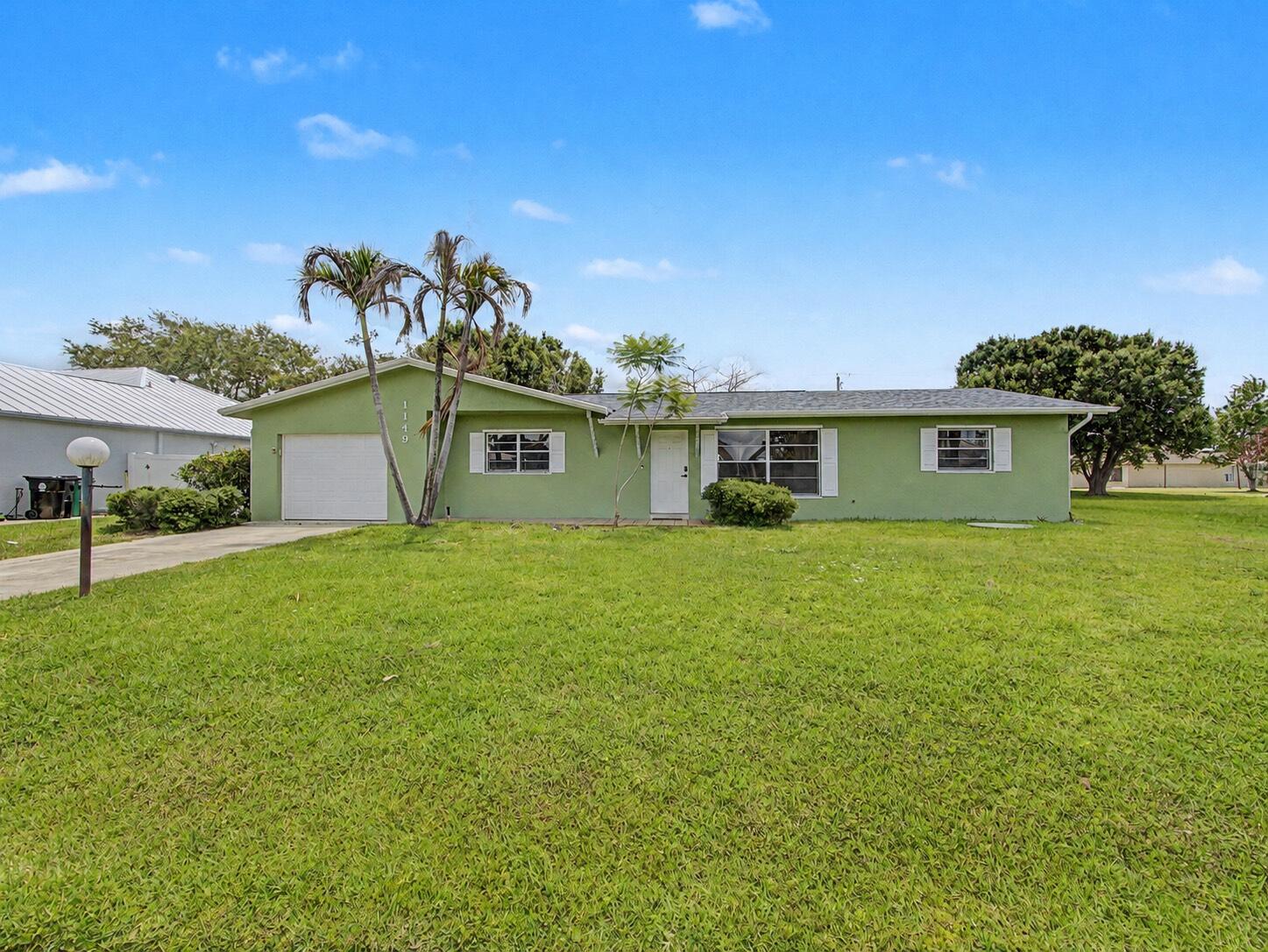 Foto de propiedad en 1149 SW Hogan Street, Port St. Lucie, FL 34983 Port St. Lucie con MLS# 