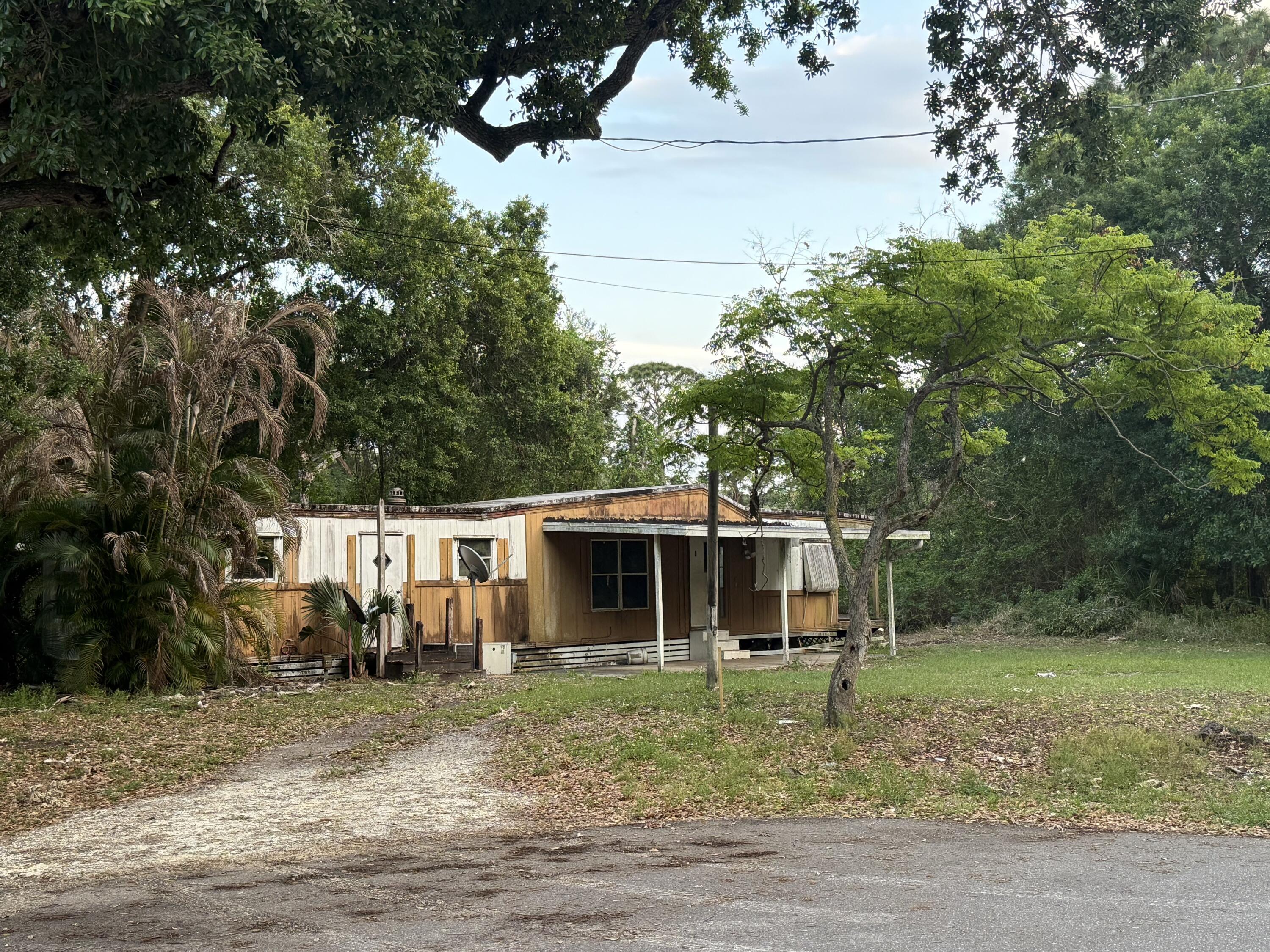 Foto de propiedad en 6072 SE 95th Trail, Okeechobee, FL 34974 Okeechobee con MLS# 