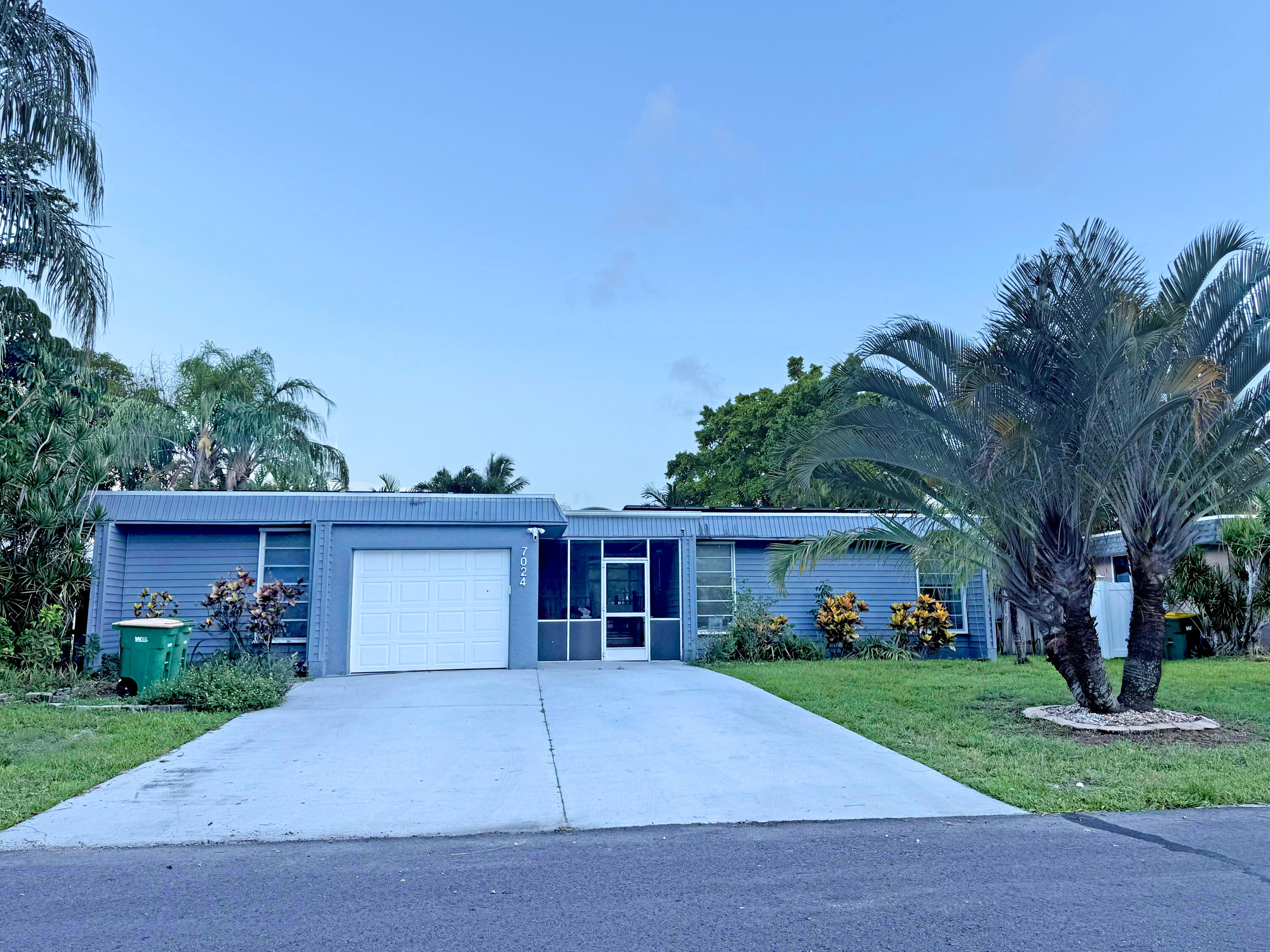 Foto de propiedad en 7024 NW 63rd Street, Tamarac, FL 33321 Tamarac con MLS# 