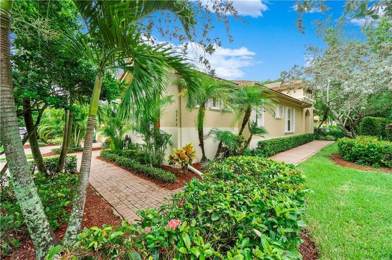 Foto de propiedad en 5742 NW 119th Drive, Coral Springs, FL 33076 Coral Springs con MLS# 