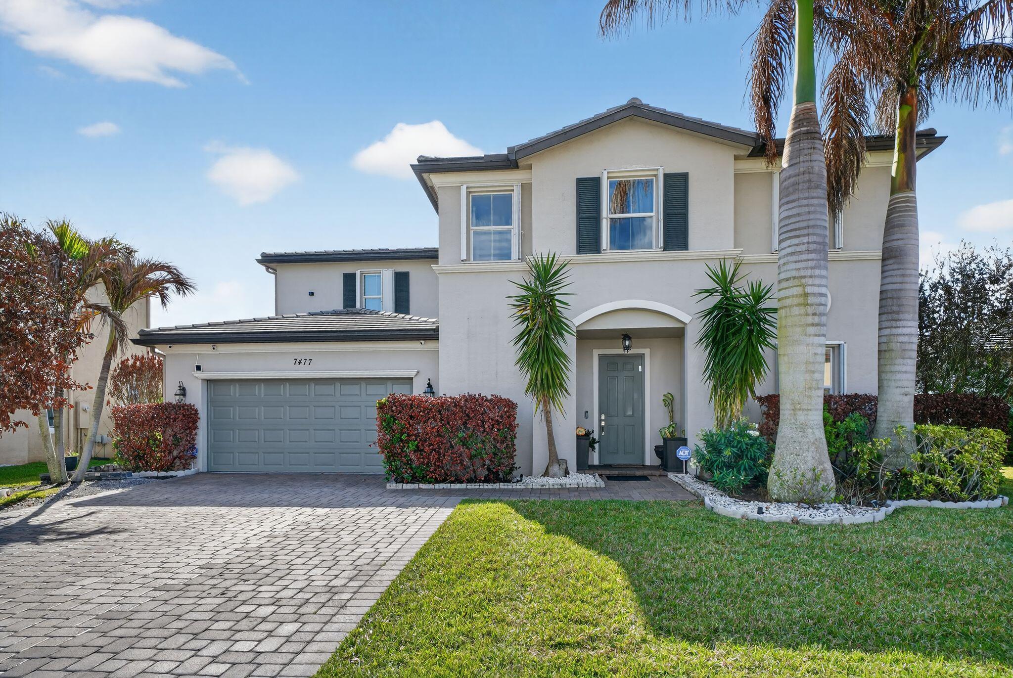 Foto de propiedad en 7477 NW Greenspring Street, Port St. Lucie, FL 34987 Port St. Lucie con MLS# 