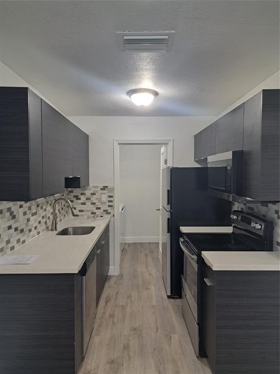 Kitchen with Quartz tops and stainless steel appliances