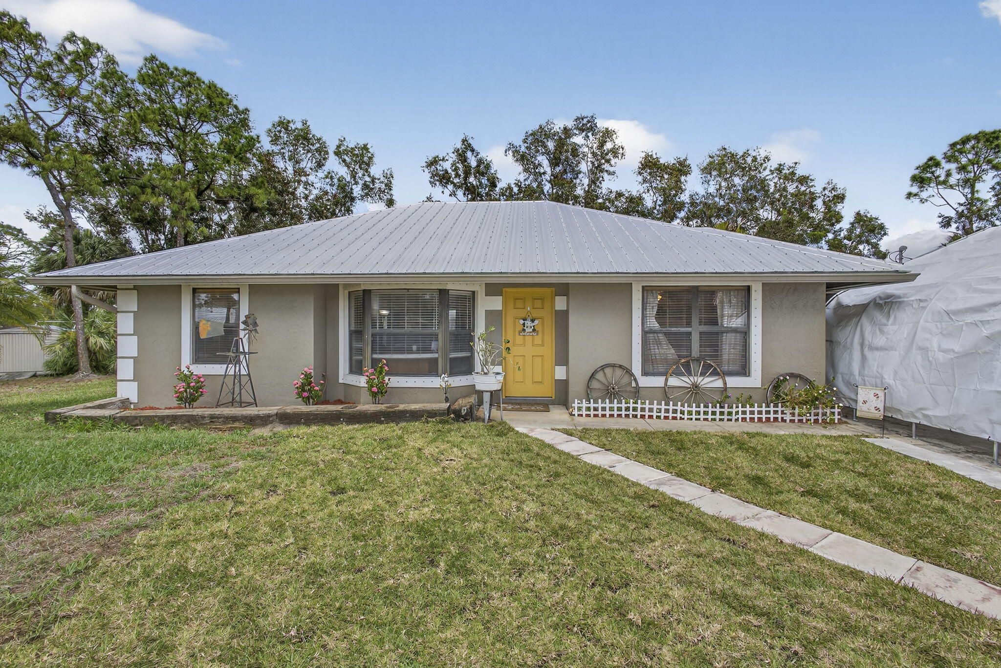 Foto de propiedad en 17815 92nd Lane N, The Acreage, FL 33470 The Acreage con MLS# 