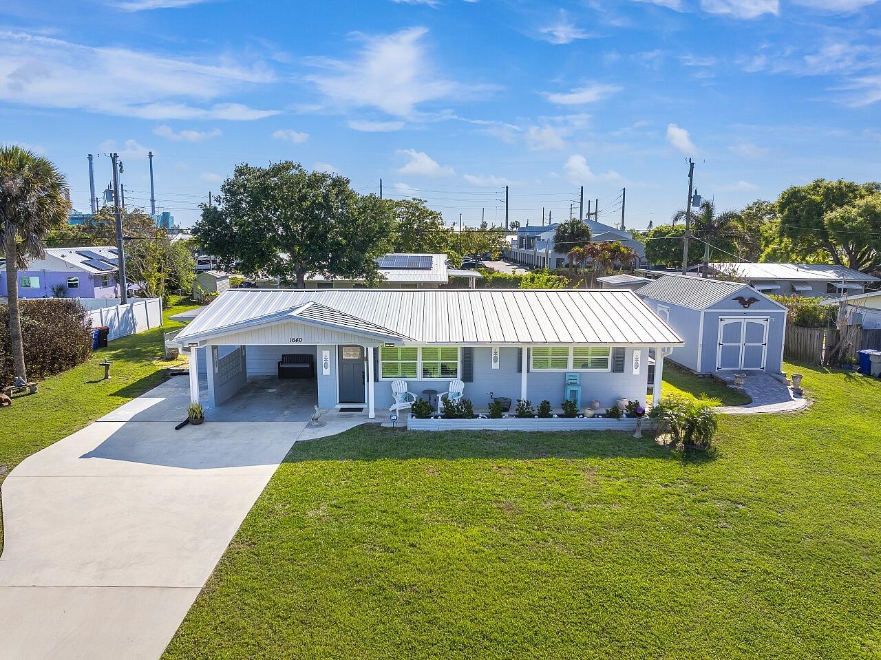 Home on .24 acres with large 12x16 shed