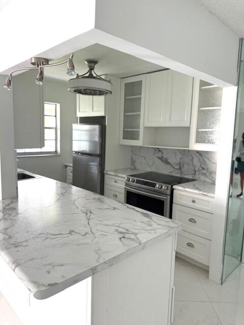 Foto de propiedad en 4755 NW 3rd Court C, Delray Beach, FL 33445 Delray Beach con MLS# 