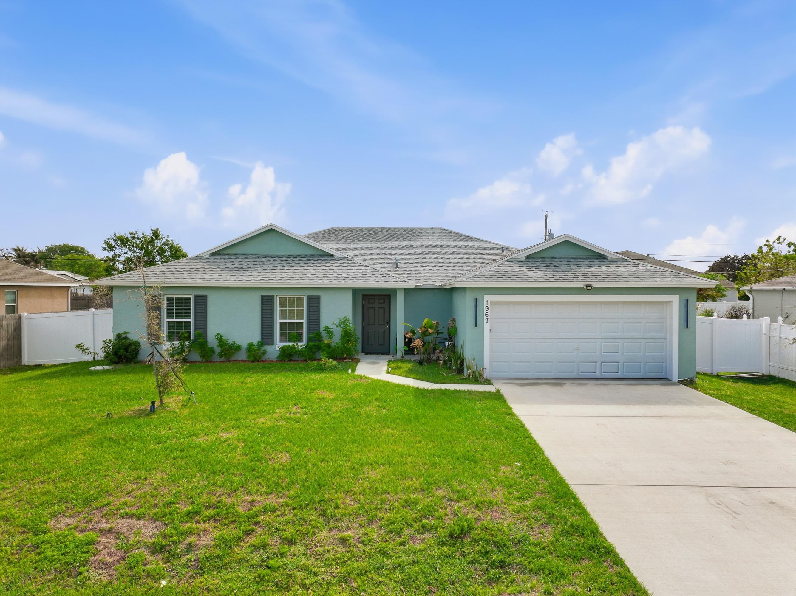 Foto de propiedad en 1967 SW Beard Street, Port St. Lucie, FL 34953 Port St. Lucie con MLS# 