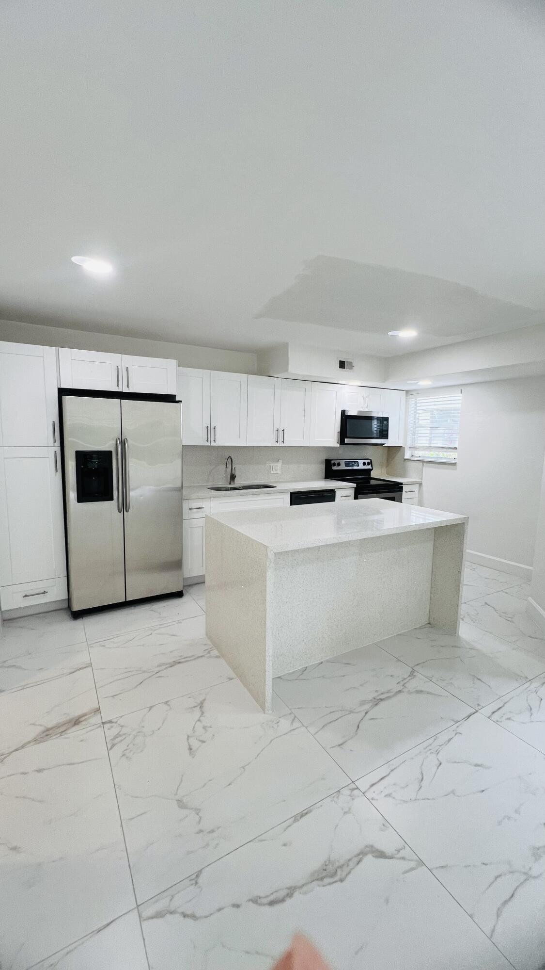 Foto de propiedad en 1401 Village Boulevard 2012, West Palm Beach, FL 33409 West Palm Beach con MLS# 