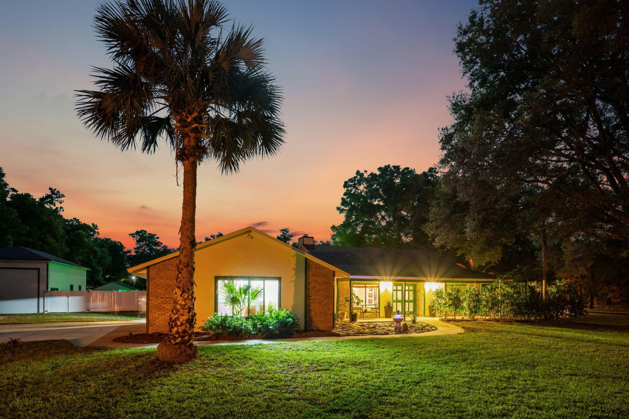 Front Exterior with mature Palm Tree
