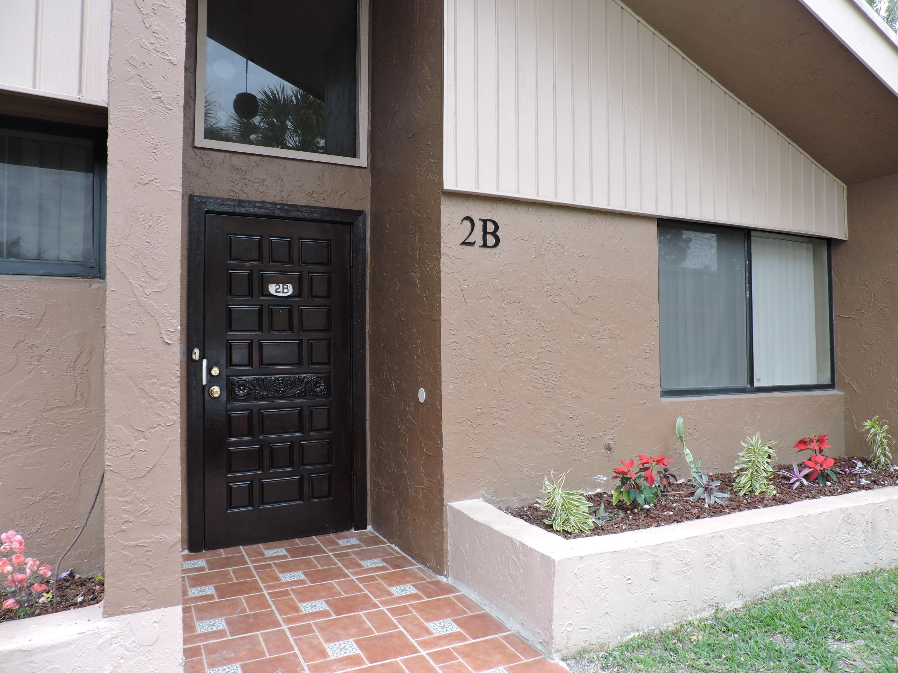 Foto de propiedad en 166 Sparrow Drive 2b, Royal Palm Beach, FL 33411 Royal Palm Beach con MLS# 