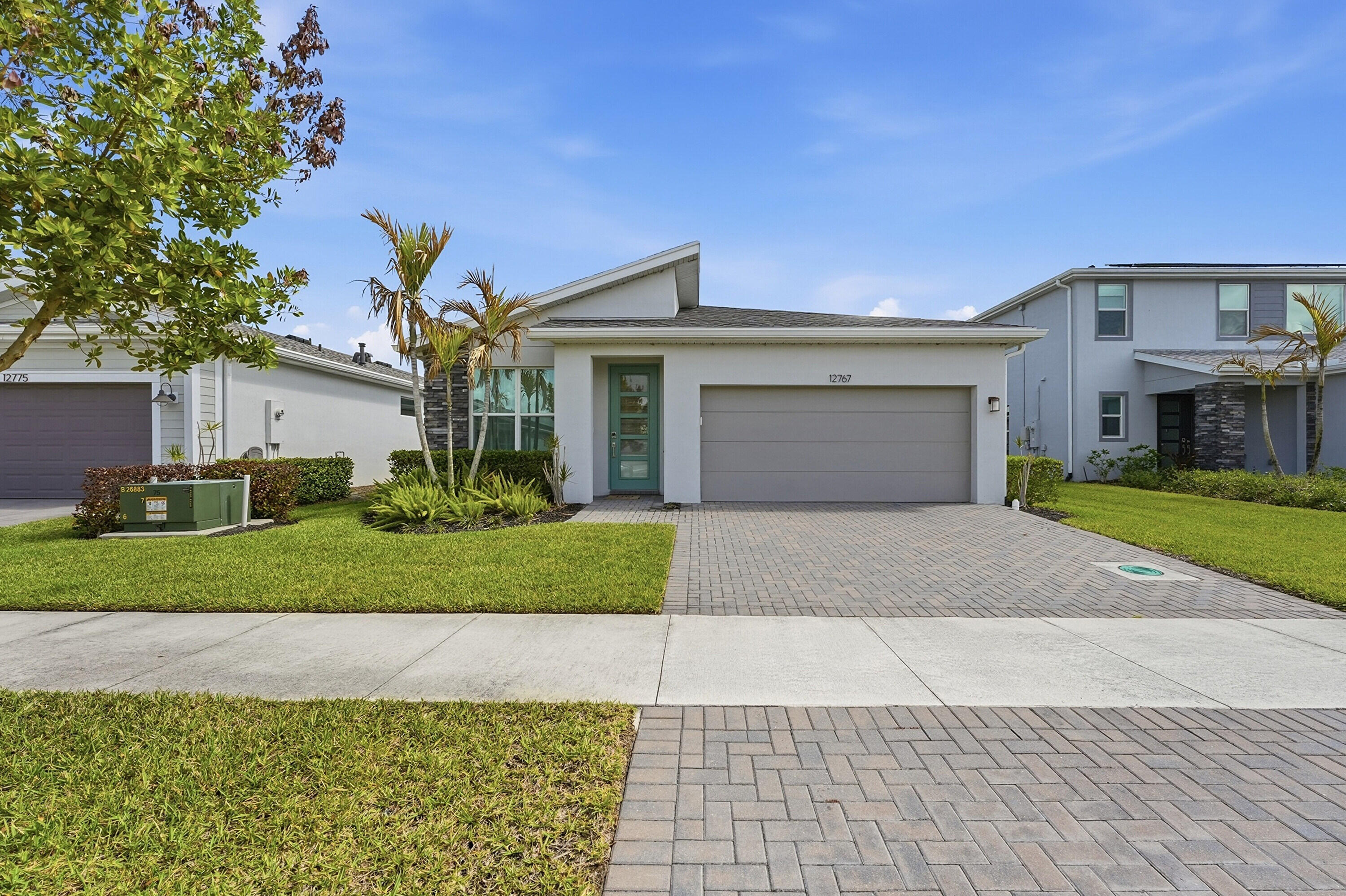 Foto de propiedad en 12767 SW Phoenix Drive, Port St. Lucie, FL 34987 Port St. Lucie con MLS# 