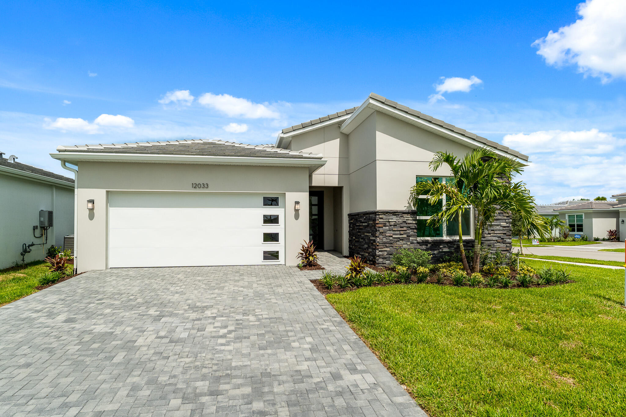 Foto de propiedad en 12033 SW Pantone Street, Port St. Lucie, FL 34987 Port St. Lucie con MLS# 