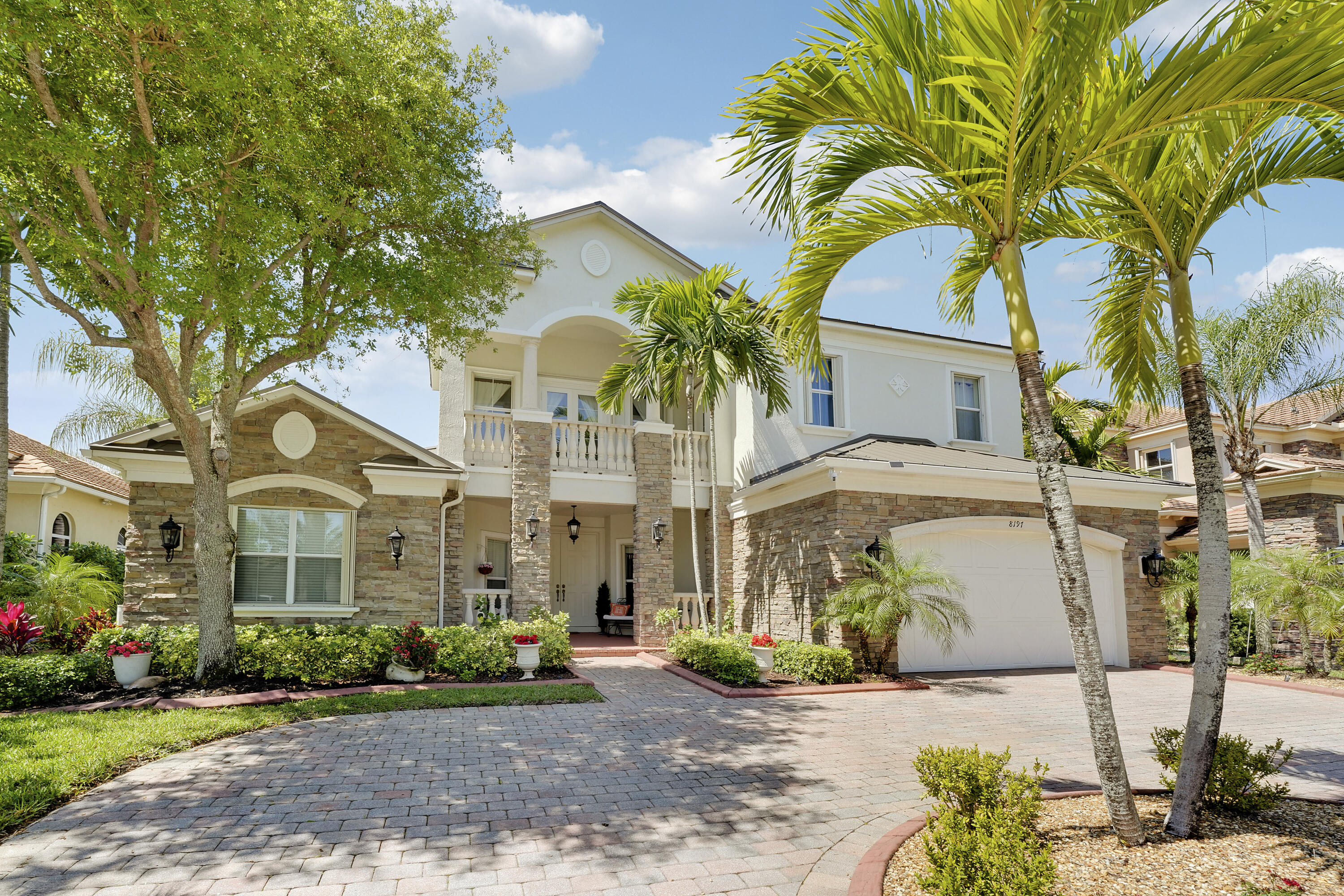 Foto de propiedad en 8197 Butler Greenwood Drive, West Palm Beach, FL 33411 West Palm Beach con MLS# 