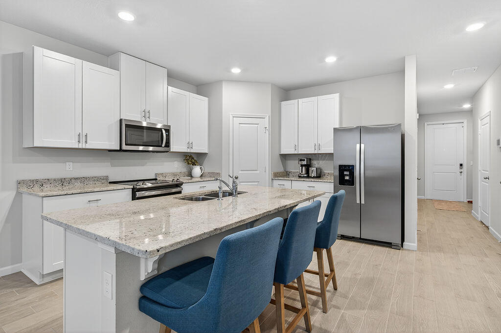 Foto de propiedad en 5696 SE Edgewater Circle, Stuart, FL 34997 Stuart con MLS# 