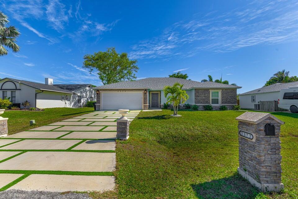Foto de propiedad en 2372 SE Maslan Avenue, Port St. Lucie, FL 34952 Port St. Lucie con MLS# 