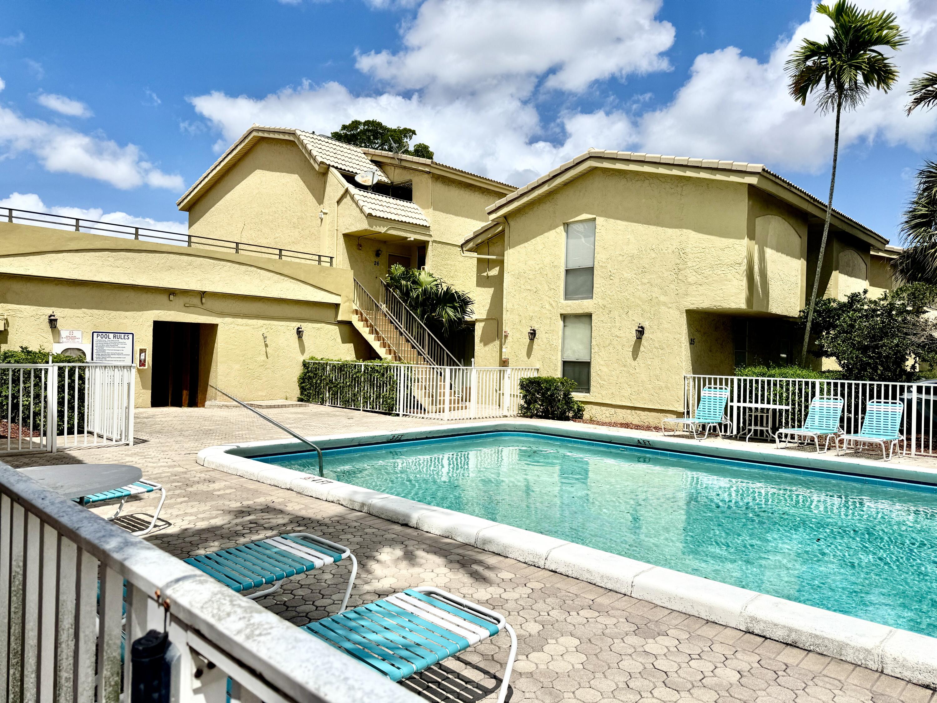 Foto de propiedad en 8401 W Sample Road 21, Coral Springs, FL 33065 Coral Springs con MLS# 